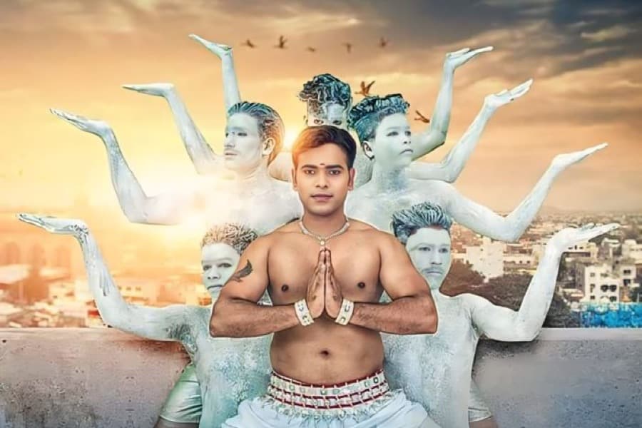 A Prince Dance Group performer in a prayer pose backed by a composited multi-armed figure motif against a sunset cityscape